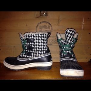 Black and white Sorel boots